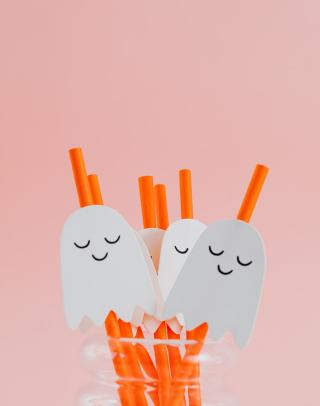 orange straws decorated with ghosts